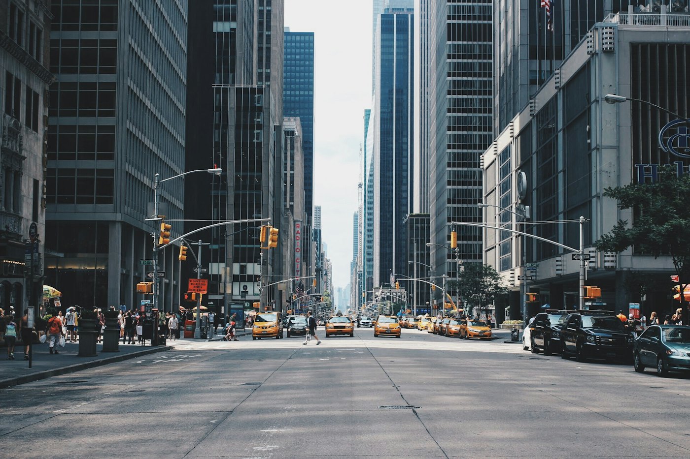 City skyline at dusk, representing connected industries